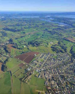 Aerial graphic of built environment and agricultural landscape